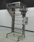 Used Del Packaging Model IVCL Incline Vertical Cap Loader.