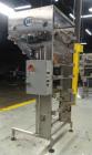 Used- Del Packaging Model IVCL Incline Vertical Cap Loader.