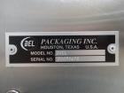 Used Del Packaging Model IVCL Incline Vertical Cap Loader.