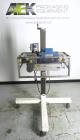 Used Eaton Dynamics overcapper belt capper.