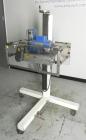 Used Eaton Dynamics overcapper belt capper.
