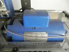Used Eaton Dynamics overcapper belt capper.