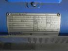 Used Eaton Dynamics overcapper belt capper.