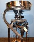 Used Healthstar 36'' Diameter Cap Sorter with Chute. Mounted on a stainless steel frame. Currently set up on approximately 1-5/8