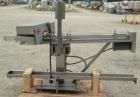 Used Holmatic Horizontal Overcapper/Lidder, stainless/aluminum construction, model PH-31. Last running 211 lids. 46
