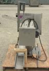 Used Holmatic Horizontal Overcapper/Lidder, stainless/aluminum construction, model PH-31. Last running 211 lids. 46