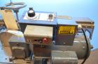 Used Johnson Nash Top Belt Compression Overcap Applicator.