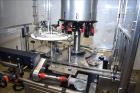 Used Change Parts Inc 8-Head Press on 