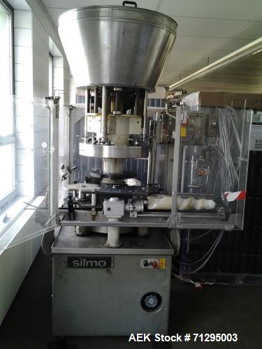 Used- Corker Bertolaso / Silmo / Okema Delta 404. Including soft starter and format settings for different wine bottles (0.3...