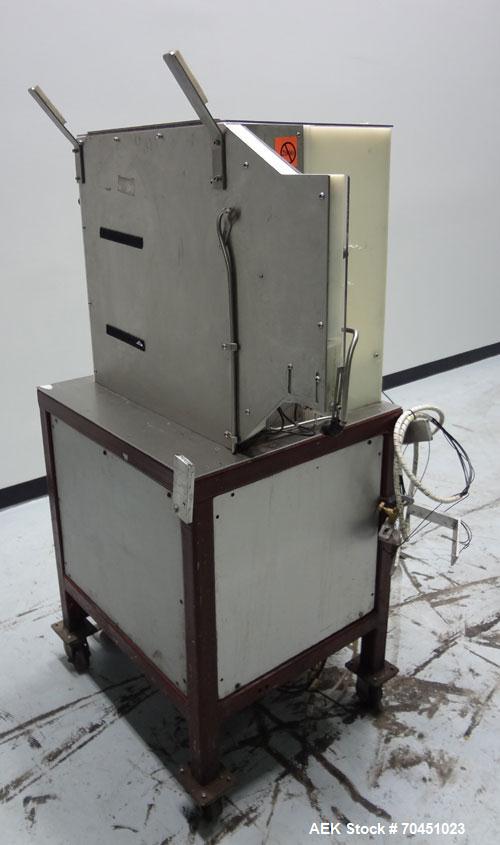 Used FDM Technologies Roller Ball Placer. Was last placing plastic 1-1/4" diameter roller balls in a cosmetic deodorant bottle. Has Appleton explosion proof junction box. Machine is mounted on caster...