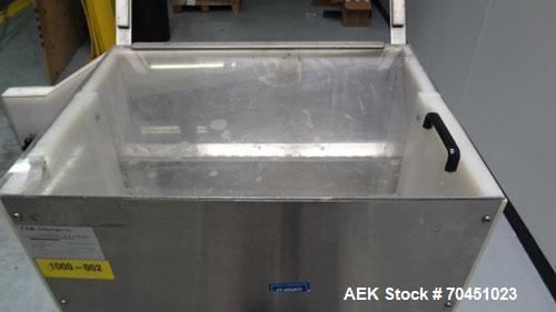 Used FDM Technologies Roller Ball Placer. Was last placing plastic 1-1/4" diameter roller balls in a cosmetic deodorant bottle. Has Appleton explosion proof junction box. Machine is mounted on caster...
