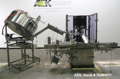 Used Anderson Model C-800 8-Head Rotary Pump Placer and Crimper for fragrance, perfume and cologne. Aluminum body finger pump sprayers crimped to glass containers. Has PMC model MM36 valve stem sorte...