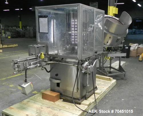 Used Anderson 8 Head Rotary Pump Placer and Crimper for fragrance, perfume and cologne. Aluminum body fragrance finger pump sprayers crimped to glass containers. Has PMC model MM36 valve stem sorter ...