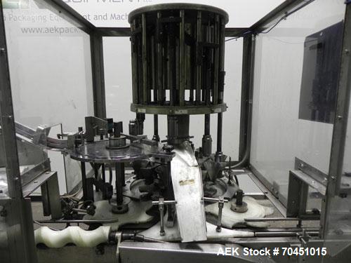 Used Anderson 8 Head Rotary Pump Placer and Crimper for fragrance, perfume and cologne. Aluminum body fragrance finger pump sprayers crimped to glass containers. Has PMC model MM36 valve stem sorter ...