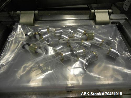 Used Anderson 8 Head Rotary Pump Placer and Crimper for fragrance, perfume and cologne. Aluminum body fragrance finger pump sprayers crimped to glass containers. Has PMC model MM36 valve stem sorter ...