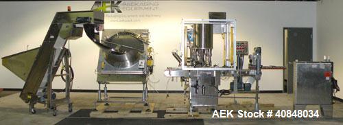 Used Anderson Machine Systems Six Spindle, Rotary Motion, Fully Automatic Pump Placing Machine. Designed to automatically sort pumps from random bulk form, apply them to bottles at speeds up to 100 p...