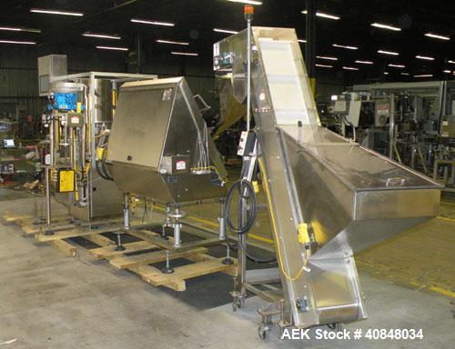 Used Anderson Machine Systems Six Spindle, Rotary Motion, Fully Automatic Pump Placing Machine. Designed to automatically sort pumps from random bulk form, apply them to bottles at speeds up to 100 p...