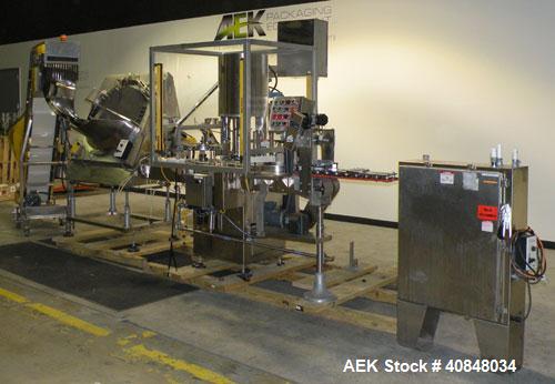 Used Anderson Machine Systems Six Spindle, Rotary Motion, Fully Automatic Pump Placing Machine. Designed to automatically sort pumps from random bulk form, apply them to bottles at speeds up to 100 p...