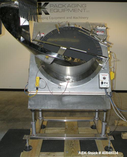 Used Anderson Machine Systems Six Spindle, Rotary Motion, Fully Automatic Pump Placing Machine. Designed to automatically sort pumps from random bulk form, apply them to bottles at speeds up to 100 p...
