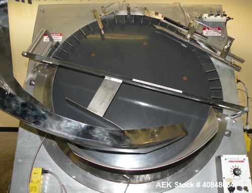 Used Anderson Machine Systems Six Spindle, Rotary Motion, Fully Automatic Pump Placing Machine. Designed to automatically sort pumps from random bulk form, apply them to bottles at speeds up to 100 p...