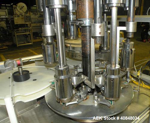 Used Anderson Machine Systems Six Spindle, Rotary Motion, Fully Automatic Pump Placing Machine. Designed to automatically sort pumps from random bulk form, apply them to bottles at speeds up to 100 p...