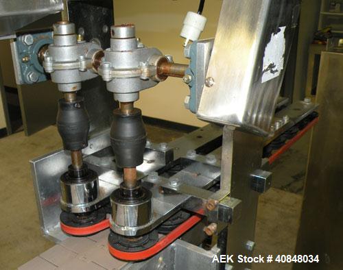 Used Anderson Machine Systems Six Spindle, Rotary Motion, Fully Automatic Pump Placing Machine. Designed to automatically sort pumps from random bulk form, apply them to bottles at speeds up to 100 p...