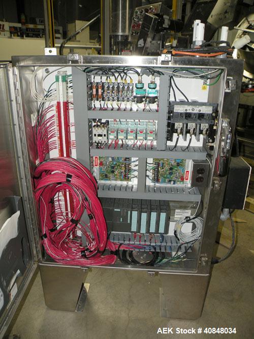 Used Anderson Machine Systems Six Spindle, Rotary Motion, Fully Automatic Pump Placing Machine. Designed to automatically sort pumps from random bulk form, apply them to bottles at speeds up to 100 p...