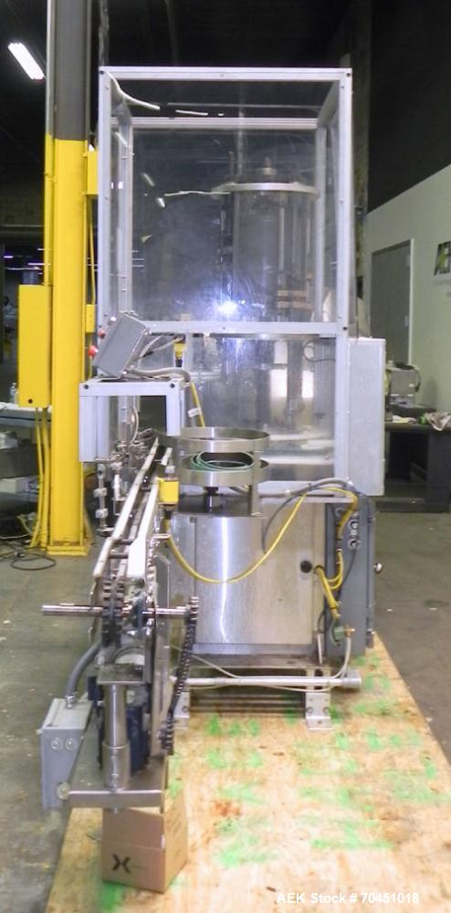Used Anderson 4 head rotary pump/cap placer,withqty 2 Anderson cap /pump sorters and 1 and elevating feeder.