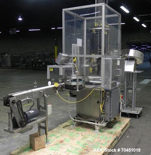 Used Anderson 4 head rotary pump/cap placer,withqty 2 Anderson cap /pump sorters and 1 and elevating feeder.