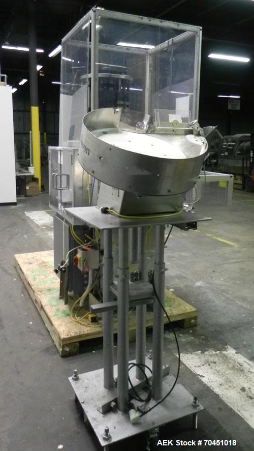 Used Anderson 4 head rotary pump/cap placer,withqty 2 Anderson cap /pump sorters and 1 and elevating feeder.