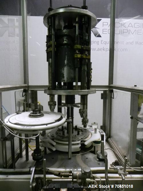 Used Anderson 4 head rotary pump/cap placer,withqty 2 Anderson cap /pump sorters and 1 and elevating feeder.