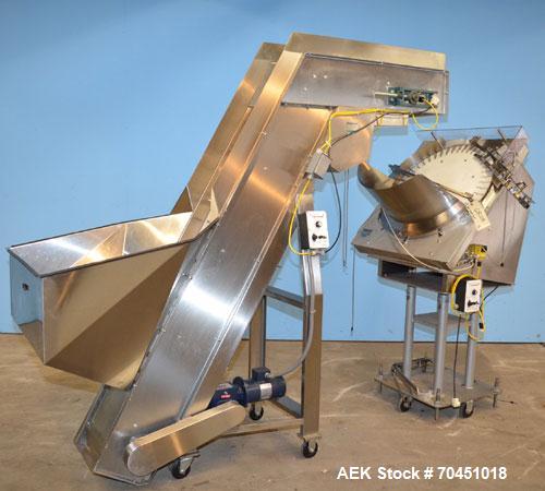 Used Anderson 4 head rotary pump/cap placer,withqty 2 Anderson cap /pump sorters and 1 and elevating feeder.