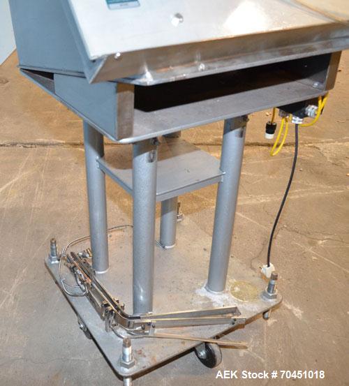 Used Anderson 4 head rotary pump/cap placer,withqty 2 Anderson cap /pump sorters and 1 and elevating feeder.