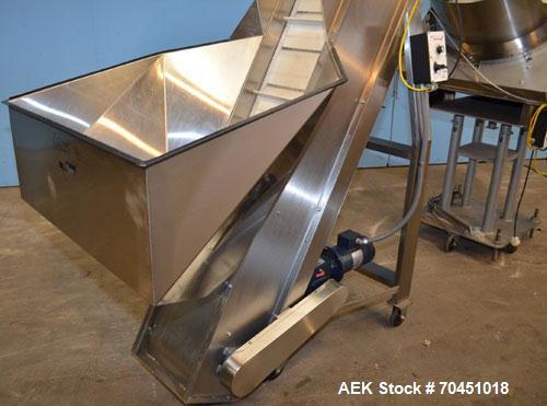 Used Anderson 4 head rotary pump/cap placer,withqty 2 Anderson cap /pump sorters and 1 and elevating feeder.