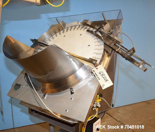 Used Anderson 4 head rotary pump/cap placer,withqty 2 Anderson cap /pump sorters and 1 and elevating feeder.