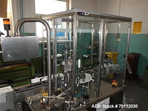 Used IMA Automatic Screw Capper, Model F97/VD5. Automatic feeding and placing of caps onto bottles. Welded steel frame with stainless steel panels. Fully safety interlocking guarding. Stainless steel...