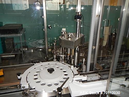 Used IMA Automatic Screw Capper, Model F97/VD5. Automatic feeding and placing of caps onto bottles. Welded steel frame with stainless steel panels. Fully safety interlocking guarding. Stainless steel...