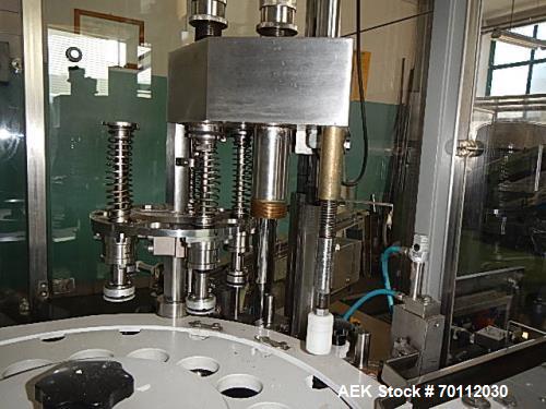 Used IMA Automatic Screw Capper, Model F97/VD5. Automatic feeding and placing of caps onto bottles. Welded steel frame with stainless steel panels. Fully safety interlocking guarding. Stainless steel...