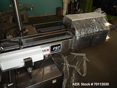 Used IMA Automatic Screw Capper, Model F97/VD5. Automatic feeding and placing of caps onto bottles. Welded steel frame with stainless steel panels. Fully safety interlocking guarding. Stainless steel...