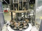 Used Anderson Model C-800 8-Head Rotary Pump Placer and Crimper for fragrance, perfume and cologne. Aluminum body finger pump sprayers crimped to glass containers. Has PMC model MM36 valve stem sorte...