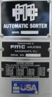 Used Anderson Model C-800 8-Head Rotary Pump Placer and Crimper for fragrance, perfume and cologne. Aluminum body finger pump sprayers crimped to glass containers. Has PMC model MM36 valve stem sorte...