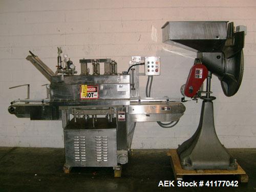 Used Diversified 76-450 Steam Capper designed to displace the air in the closure and head space of the container with steam. Automatically applies lug or PT style caps onto glass containers. Currentl...