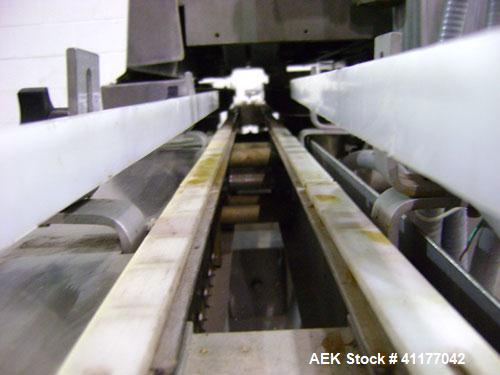 Used Diversified 76-450 Steam Capper designed to displace the air in the closure and head space of the container with steam. Automatically applies lug or PT style caps onto glass containers. Currentl...