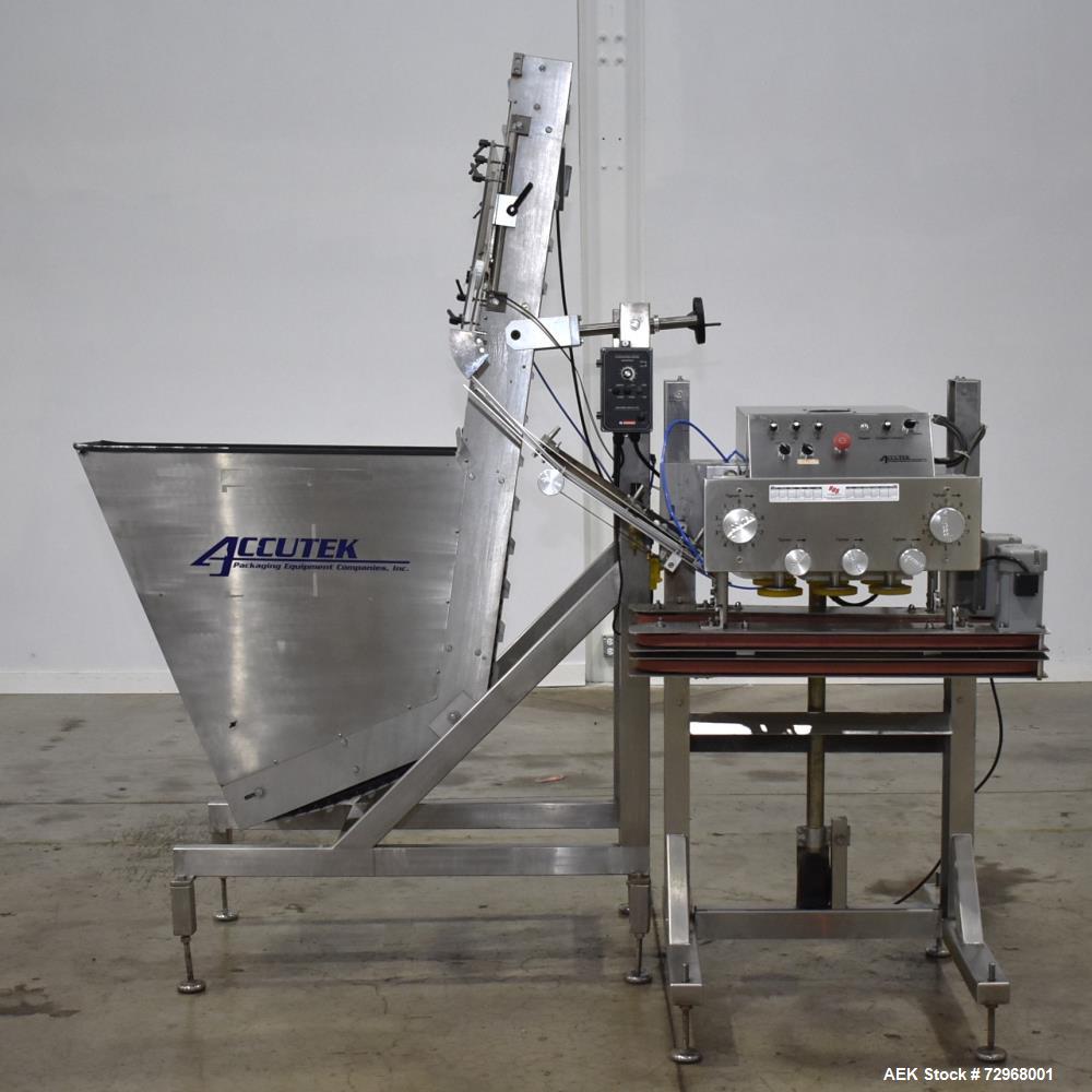 Used Accutek Inline Quill Capper, Model A-17. Set-up with 6-spindles and side-belt container transfer. Approximate speed 200 CPM. Approximate cap size range: 10mm to 120mm. Includes Accutek waterfall...