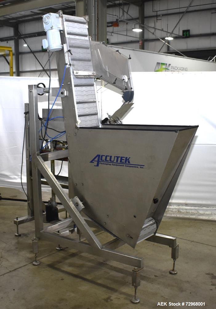 Used Accutek Inline Quill Capper, Model A-17. Set-up with 6-spindles and side-belt container transfer. Approximate speed 200 CPM. Approximate cap size range: 10mm to 120mm. Includes Accutek waterfall...
