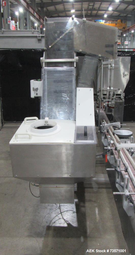Used Aesus Capper, Model Delta Cap-4. With conveyor. 1/60/208V.