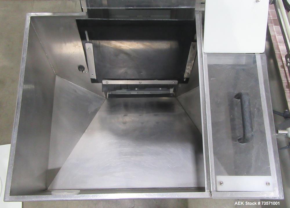 Used Aesus Capper, Model Delta Cap-4. With conveyor. 1/60/208V.