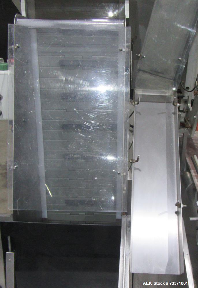 Used Aesus Capper, Model Delta Cap-4. With conveyor. 1/60/208V.