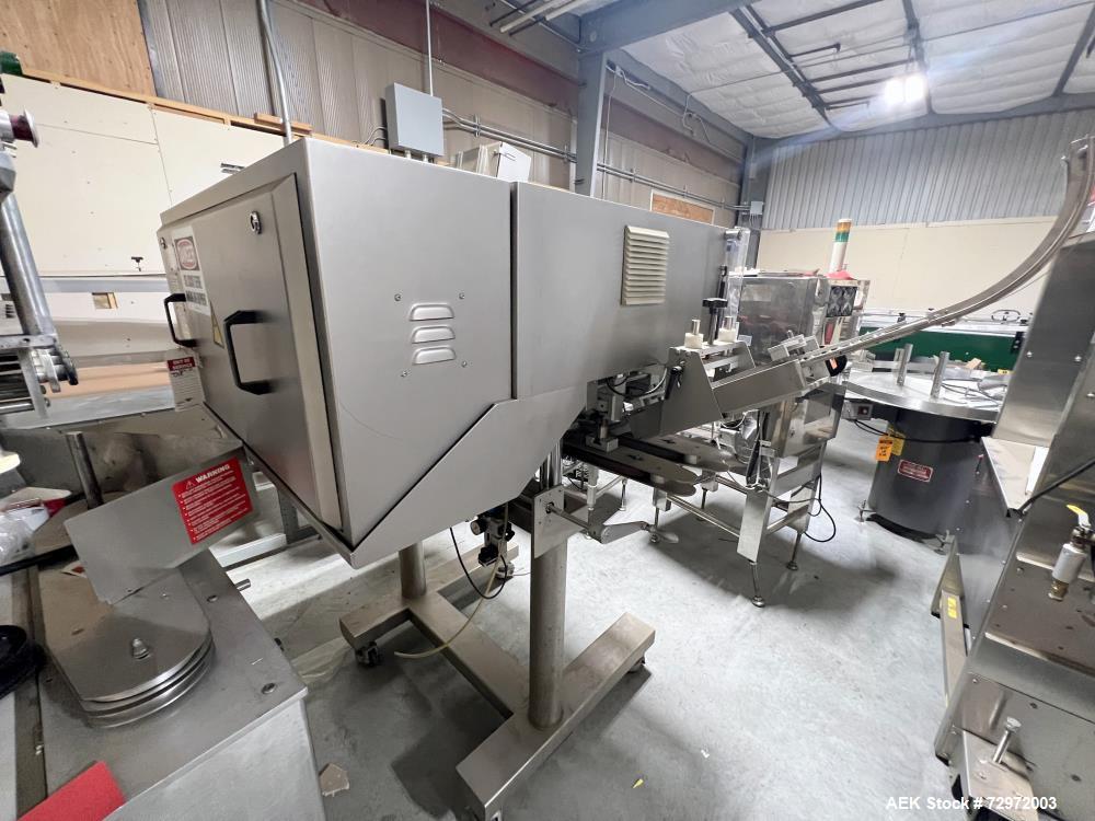 Used CVC Technologies Model CVC1205 IN-Line Spindle Capper. Capable of speeds up to 120 Bottles per minute (BPM). Cap diameter: 1 to 4-1/4" (25mm - 108mm). Cap height: 1/2 to 3/4" (13 - 19mm). Bottle...