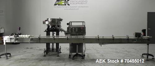 Used ELF Model CT400L Automatic Inline Quill Capper. Fully adjustable for a cap size range of 8mm - 110mm wide and a container size range of 1" - 14" tall. Has wormscrew timing infeed on a 255" x 4-1...
